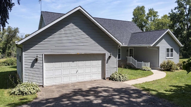 view of front of property with a garage and a porch