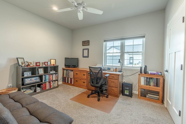 office space featuring ceiling fan and carpet flooring