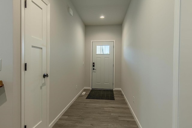 doorway featuring hardwood / wood-style flooring