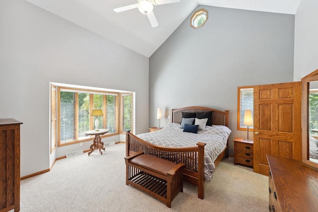 S2916A Fairway Dr, Reedsburg, WI 53959 - bedroom featuring light carpet, high vaulted ceiling, and ceiling fan