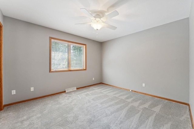 S2916A Fairway Dr, Reedsburg, WI 53959 - empty room with ceiling fan and light colored carpet