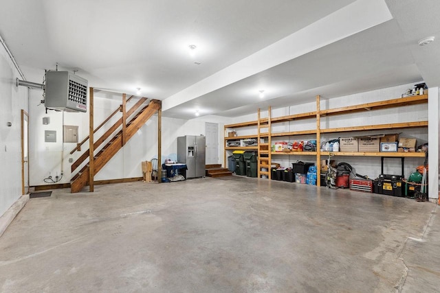 S2916A Fairway Dr, Reedsburg, WI 53959 - basement with electric panel and stainless steel refrigerator with ice dispenser