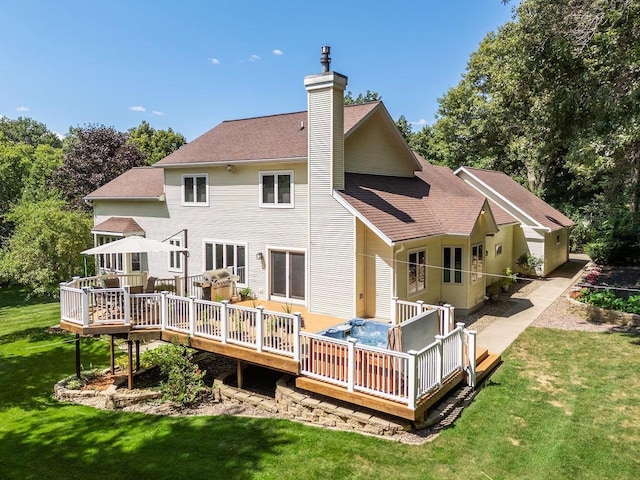 S2916A Fairway Dr, Reedsburg, WI 53959 - back of property with a lawn and a wooden deck