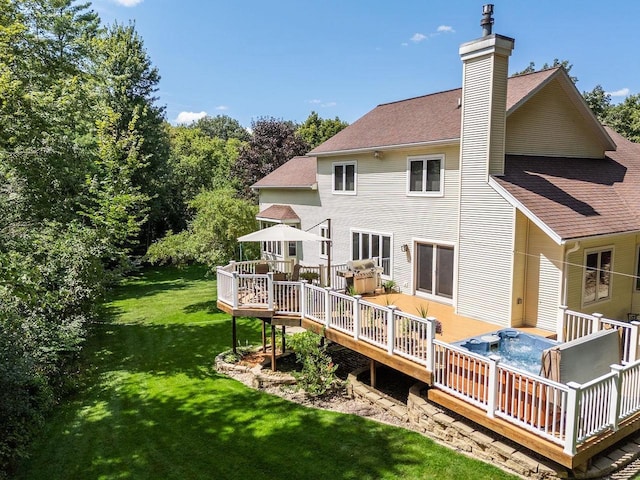 S2916A Fairway Dr, Reedsburg, WI 53959 - rear view of house featuring a yard and a wooden deck