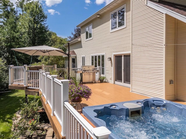 S2916A Fairway Dr, Reedsburg, WI 53959 - back of property featuring a hot tub and a deck