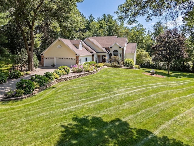 S2916A Fairway Dr, Reedsburg, WI 53959 - ranch-style home with a front yard and a garage