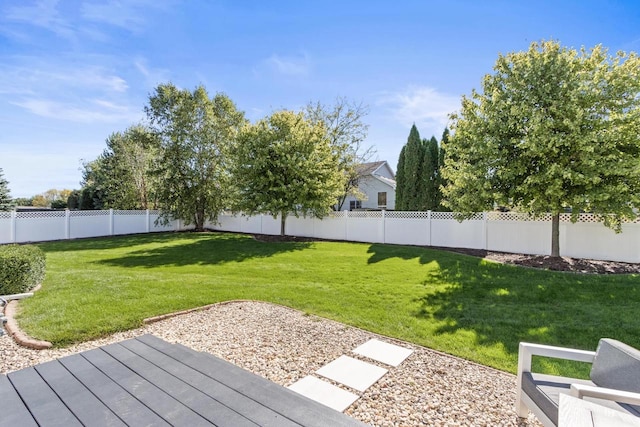 view of yard featuring a wooden deck