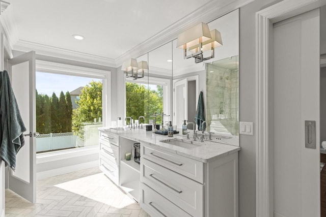 bathroom with a shower with shower door, vanity, parquet flooring, crown molding, and a notable chandelier