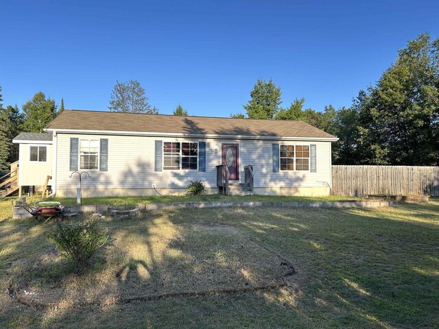 view of front of home with a front lawn