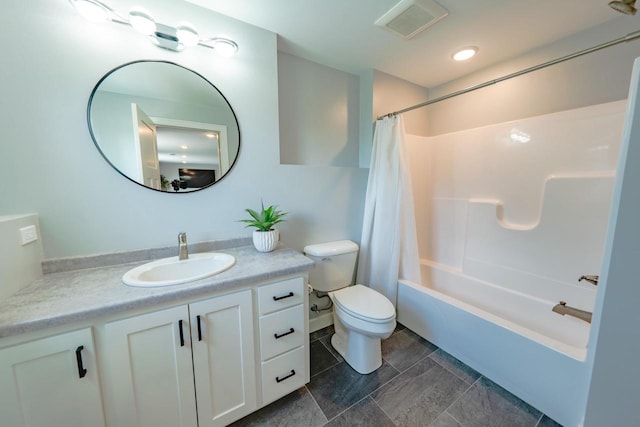 full bathroom with vanity, toilet, and shower / bath combo with shower curtain