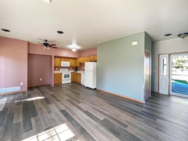 kitchen featuring ceiling fan, white appliances, and dark hardwood / wood-style floors