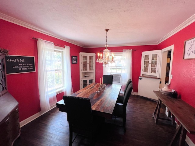 dining space with an inviting chandelier, crown molding, plenty of natural light, and dark hardwood / wood-style floors