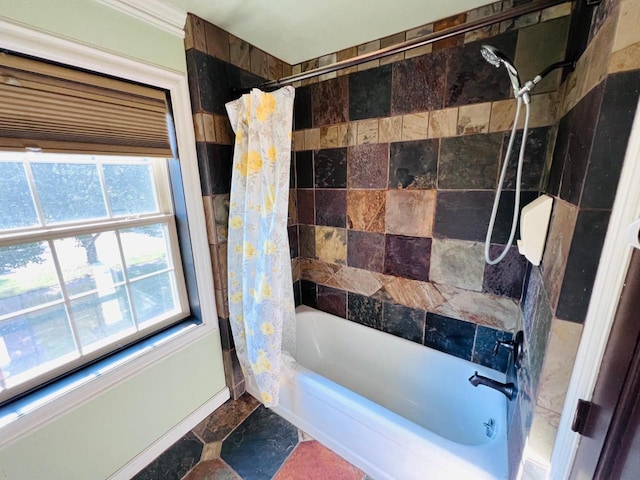 bathroom with shower / bathtub combination with curtain