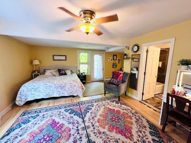 bedroom featuring ceiling fan and wood-type flooring