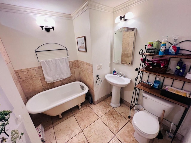 bathroom featuring ornamental molding, toilet, tile patterned flooring, and a bath