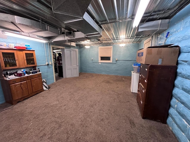 basement with carpet floors