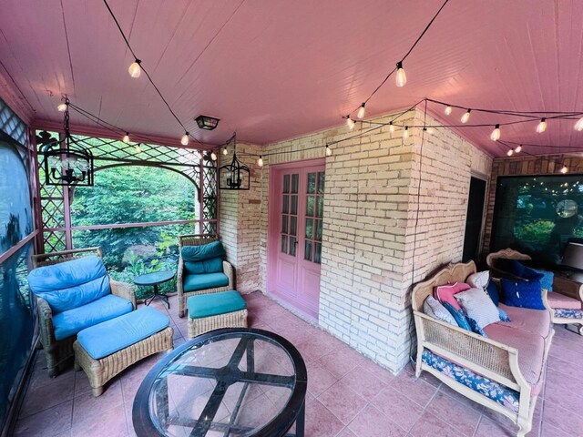 view of patio with french doors and an outdoor hangout area