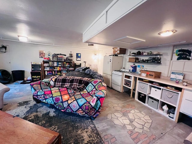 garage featuring white fridge