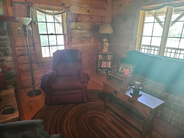 sitting room with hardwood / wood-style floors