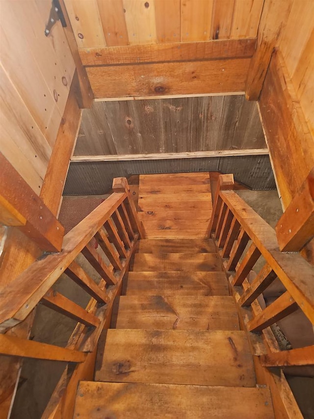 stairway featuring hardwood / wood-style flooring