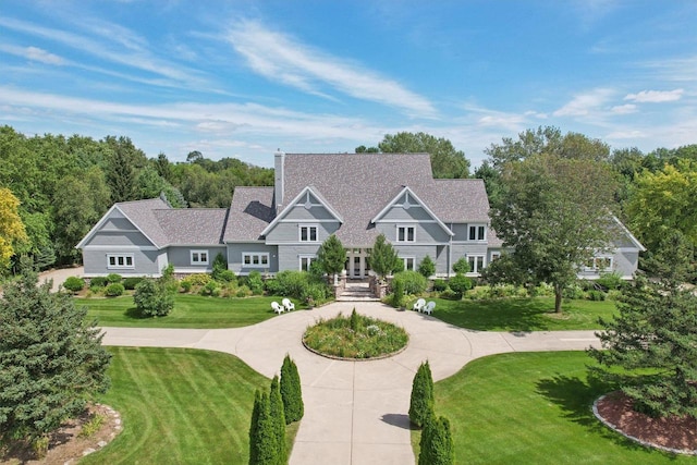 view of front of property with a front lawn