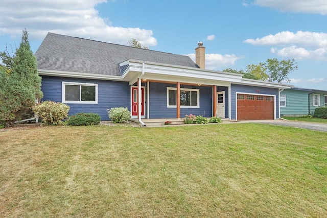 ranch-style home with a garage, covered porch, and a front lawn