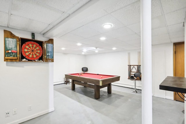 playroom featuring concrete flooring, billiards, a paneled ceiling, and baseboard heating