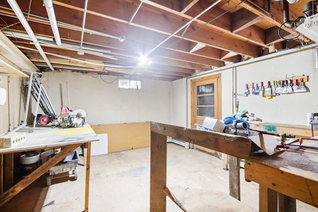 basement with a workshop area