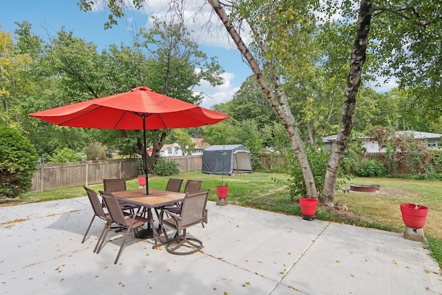 view of patio with a shed