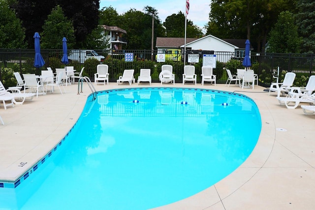 view of pool featuring a patio area