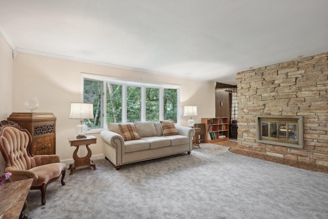 carpeted living room featuring crown molding and a stone fireplace