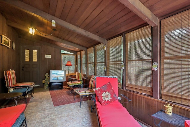 sunroom / solarium featuring wooden ceiling and lofted ceiling with beams