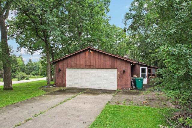 garage with a lawn