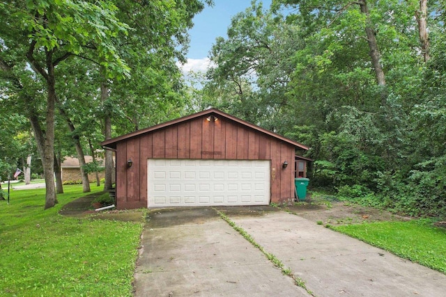 garage with a lawn