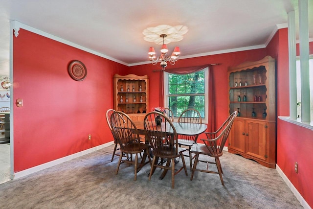 dining space featuring a chandelier, carpet floors, and ornamental molding