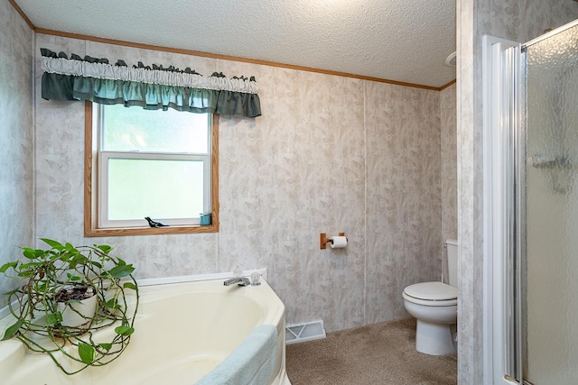 bathroom with a textured ceiling, toilet, independent shower and bath, and ornamental molding