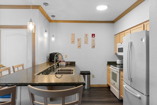 kitchen featuring dark hardwood / wood-style flooring, light brown cabinetry, hanging light fixtures, crown molding, and white appliances