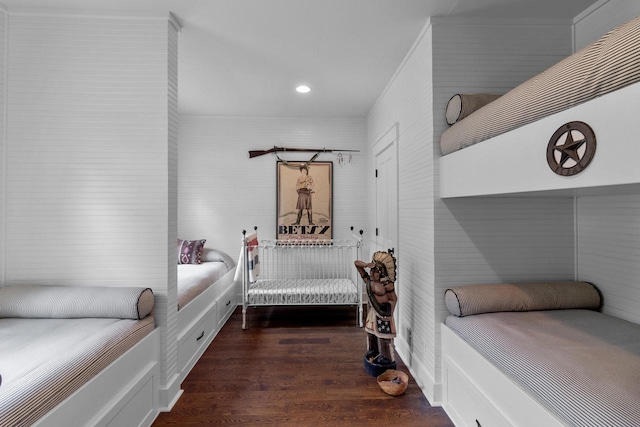 bedroom featuring dark hardwood / wood-style flooring