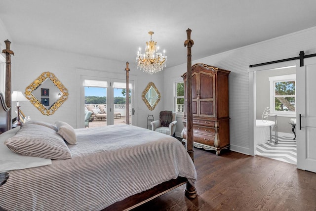 bedroom with access to outside, ensuite bath, a barn door, dark wood-type flooring, and a chandelier