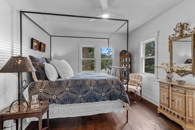 bedroom featuring ceiling fan and dark wood-type flooring