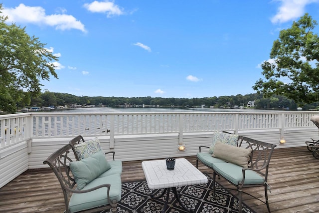 wooden terrace with a water view