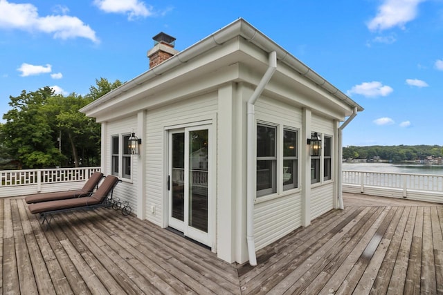 wooden deck with a water view