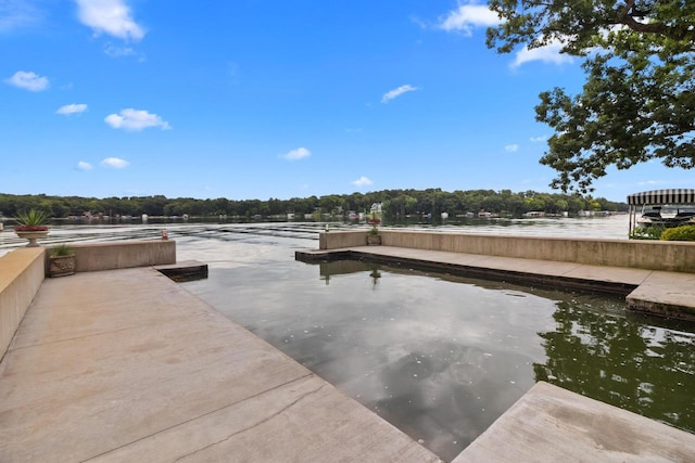 view of dock featuring a water view