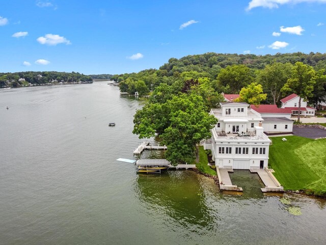 drone / aerial view featuring a water view