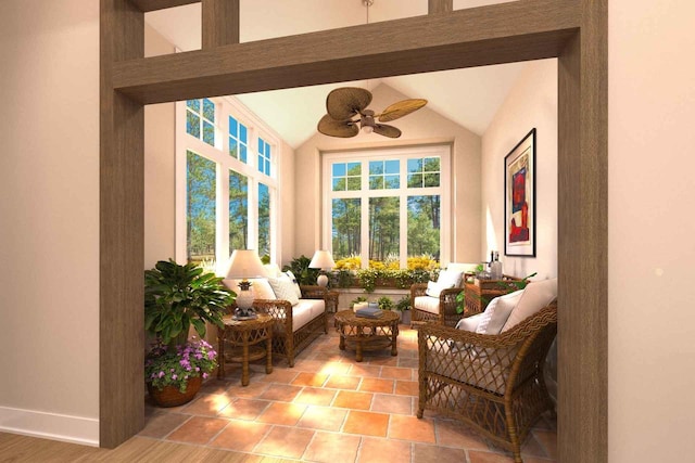 sunroom / solarium featuring lofted ceiling and ceiling fan