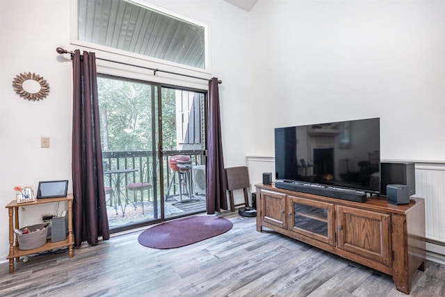 living room with light hardwood / wood-style floors