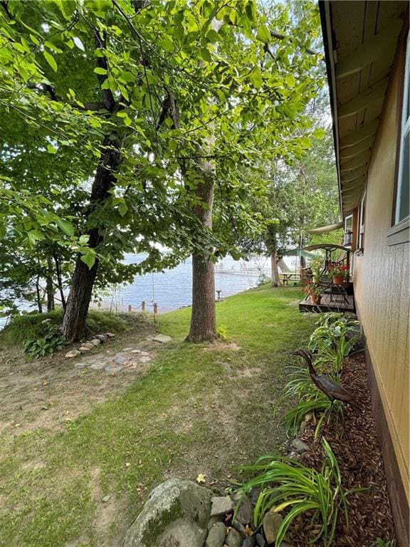 view of yard with a water view