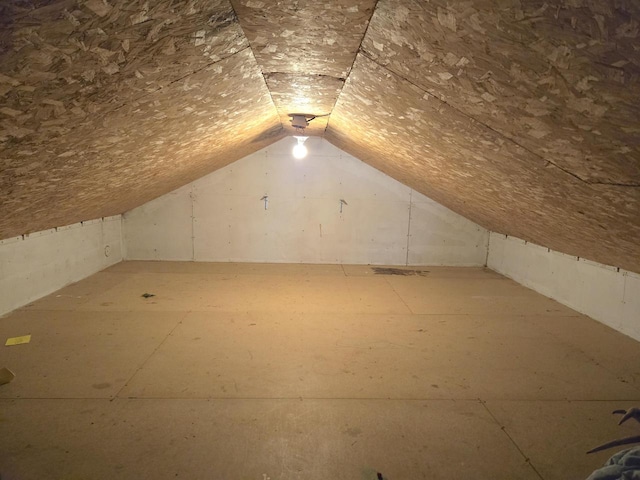 bonus room featuring vaulted ceiling