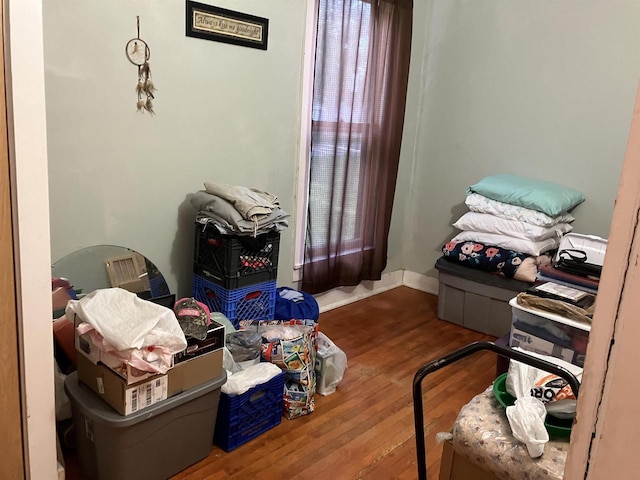 bedroom with hardwood / wood-style floors