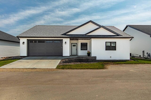 modern farmhouse with a garage